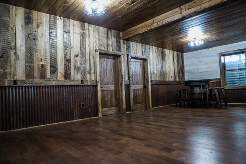 circle sawn barn wood siding with rusted steel wainscotting