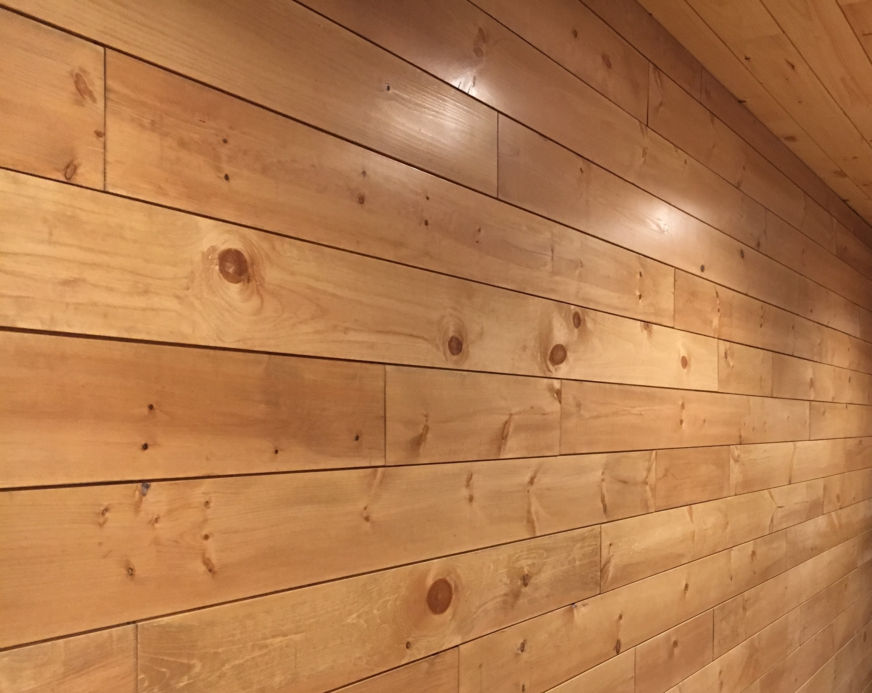 nickel gap wood siding from Northern Log with natural finish inside a home