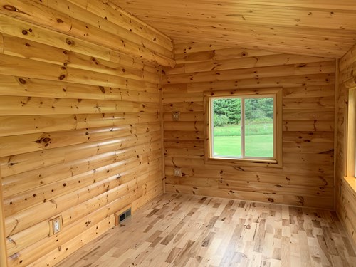 2x8 pine smooth interior log siding with clear finish.