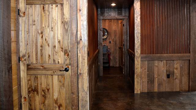 Barnwood Paneled Interior with Knotty Doors